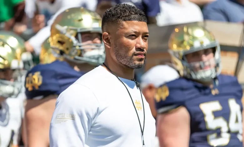 Wrestling coach accuses Notre Dame football coach Marcus Freeman of battery