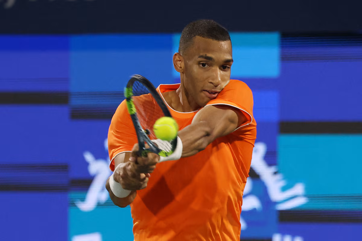 Auger-Aliassime eventually takes opening-round match in Dubai