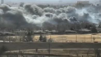 Black smoke billows across the Denver metro area
