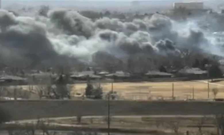 Black smoke billows across the Denver metro area