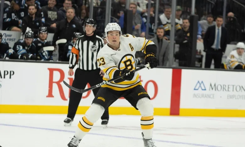 Bruins, USA defenceman McAvoy leaves game after taking high hit