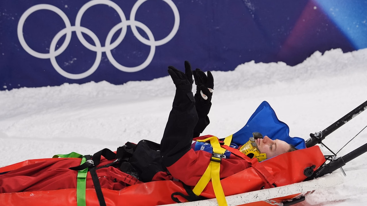 Canadian freeskier Cassie Sharpe crashes and is stretchered off halfpipe during qualifying