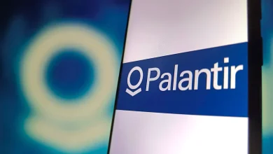 FTSE 100 lower and US shares mixed as mega-cap companies report