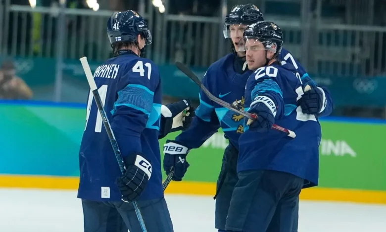 Finland uses late comeback to stun Switzerland, reach semifinals