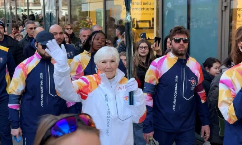 Gail Miller carries Olympic torch through Milan ahead of 2026 Games
