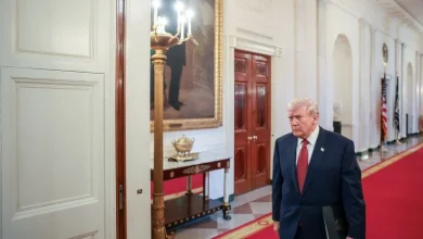 Governors association says all members now invited to White House meeting as Trump defends exclusion of Moore and Polis