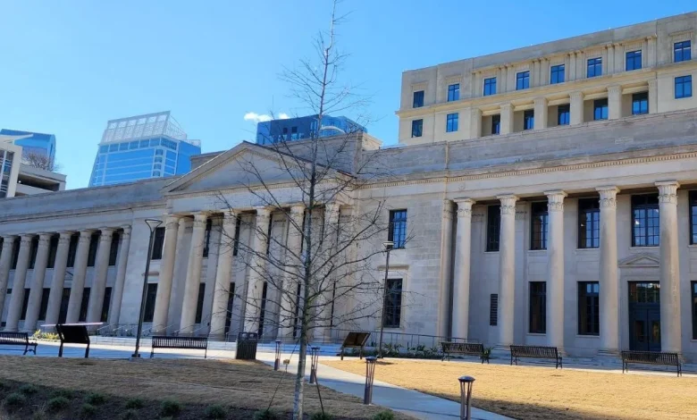 Joe Gibbs Racing, Chirs Gabehart and Spire have their first day in court