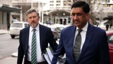 Justice Department un-redacts more names in Epstein files after pressure from lawmakers