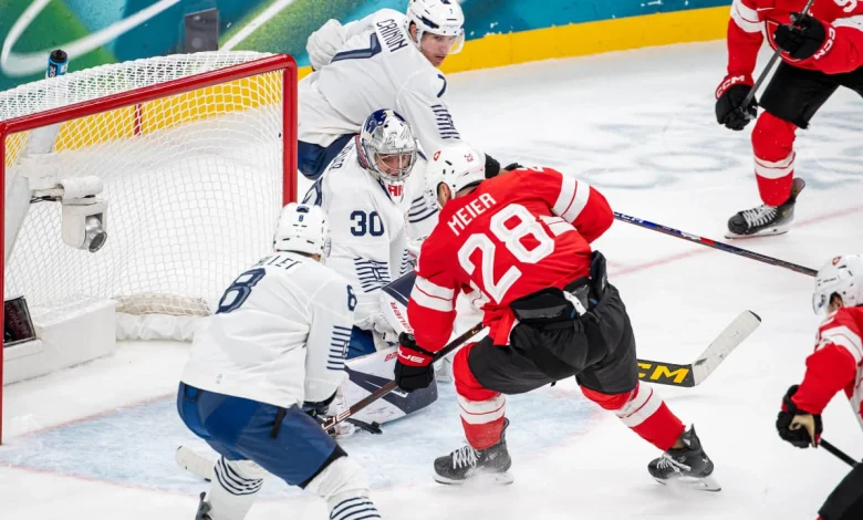 Meier scores twice, Switzerland defeats France in Group A opener