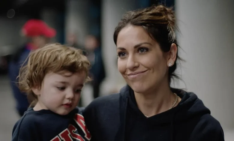 Meredith Gaudreau supporting Team USA, Johnny, at Olympics