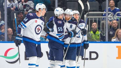 Perfetti scores in OT, Jets rally past Canucks