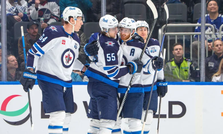 Perfetti scores in OT, Jets rally past Canucks