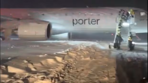 Porter Airlines plane slides off tarmac after landing in heavy snow at Halifax airport