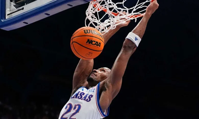 Saunders' career game rallies No. 13 BYU from 21-point deficit before loss to No. 14 Kansas