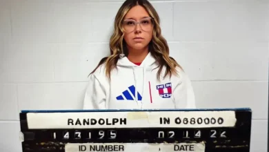 School secretary, 31, accused of having sex with two students after husband catches her with one of them