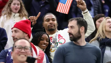 Simone Biles cheers on Team USA against Sweden in quarterfinals