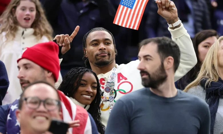 Simone Biles cheers on Team USA against Sweden in quarterfinals