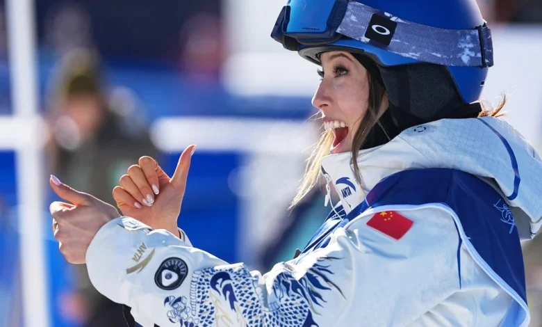 Skier Eileen Gu sports a personalized, detail-studded ski suit at Milano Cortina Olympics