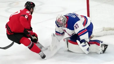 What's the stuffed animal given to USA, Canada after Olympic hockey gold medal match?
