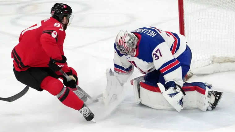 What's the stuffed animal given to USA, Canada after Olympic hockey gold medal match?