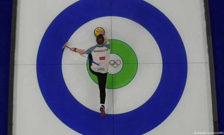 Winter Olympics begin quietly with curling