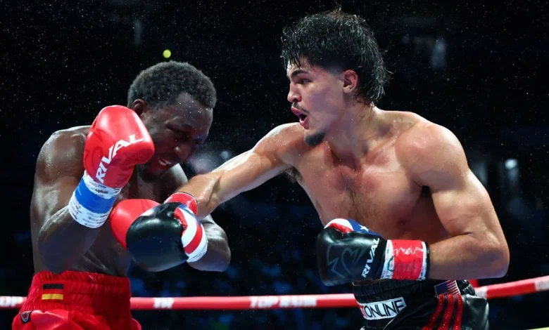 Xander Zayas unifies titles in close decision over Abass Baraou