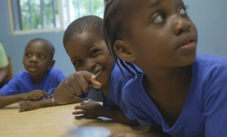 At Mitch Albom's orphanage in violence-riddled Port-au-Prince, kids grow up behind walls