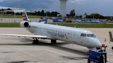 CRJ700 diverts after radome apparently holed during Washington take-off