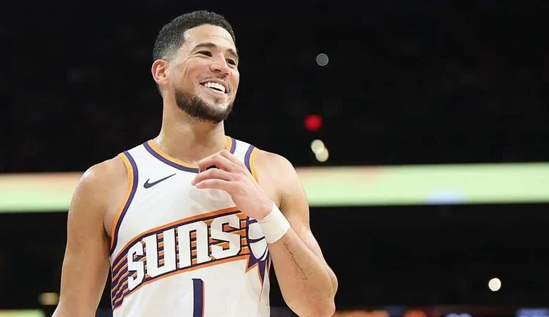 Devin Booker surprises BYU men’s basketball team with custom Book 2s