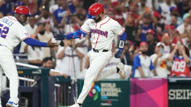 Dominican Republic's Austin Wells hits 3-run homer in 10-0 win