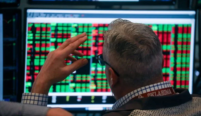 Dow tumbles more than 800 points as tariff uncertainty and AI disruption fears roil markets