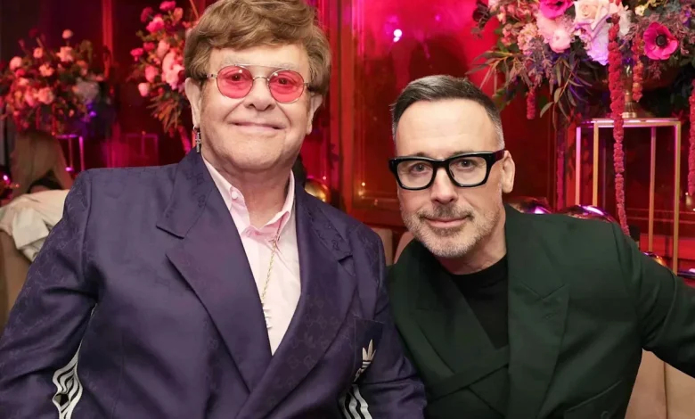 Elton John's husband David Furnish gives update on singer's health: 'He's battling on'