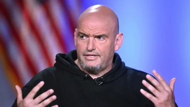 Fetterman breaks with Democrats, casts key vote for Mullin