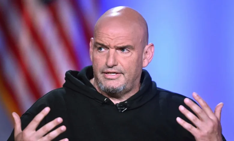 Fetterman breaks with Democrats, casts key vote for Mullin