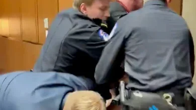 GOP senator joins police in ejecting anti-war protester from Capitol Hill hearing