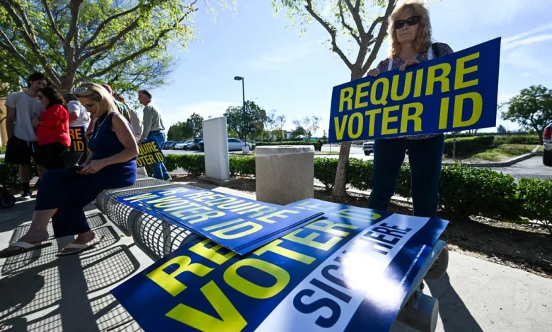 In voting process, photo ID gets wide support, Republicans more likely to believe there's fraud, CBS News poll finds