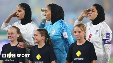 Iran footballers sing and salute to anthem at Asian Cup after prior silence