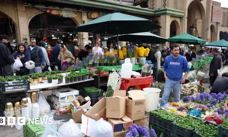 Iranians prepare for Persian new year under shadow of war