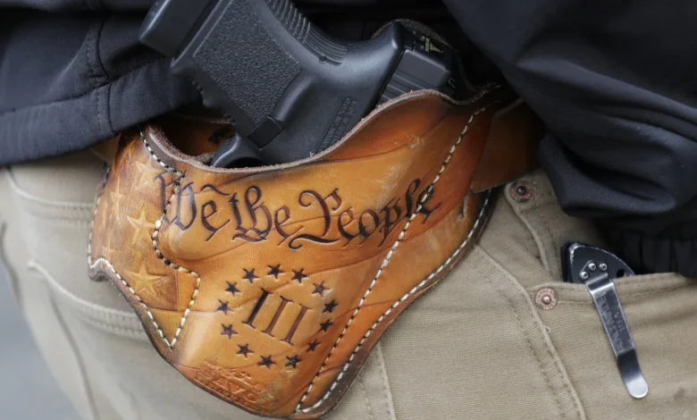 Justice Department restarts program to restore gun rights : NPR