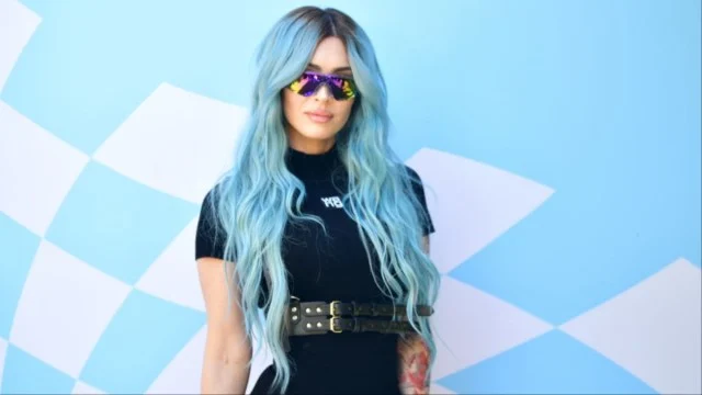 Megan Fox Returns to Instagram in Bold Corset Top & Sheer Tights Look