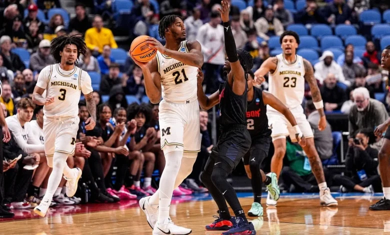 No. 1 Michigan outshoots Howard in high-scoring win