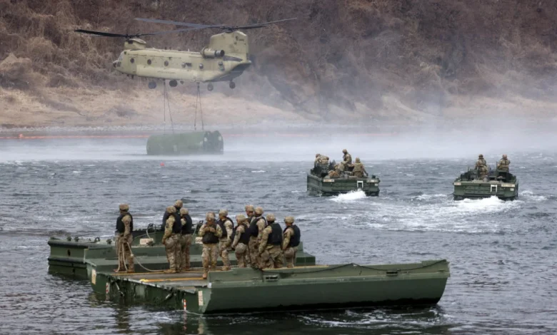 North Korea fires about 10 ballistic missiles toward sea in show of force, South Korea says