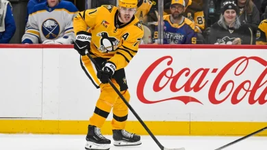 Penguins' Evgeni Malkin slashes Sabres' Rasmus Dahlin in the head