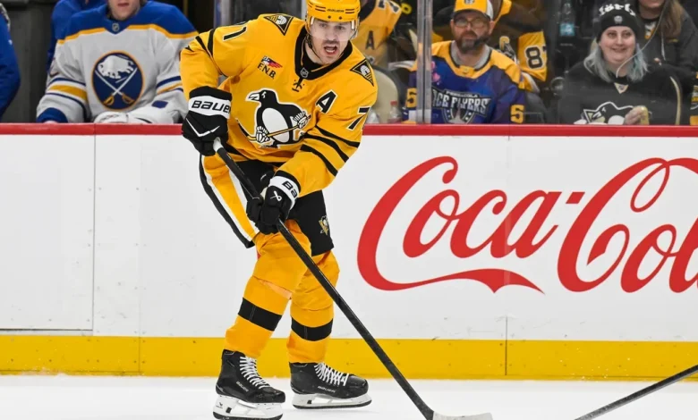 Penguins' Evgeni Malkin slashes Sabres' Rasmus Dahlin in the head