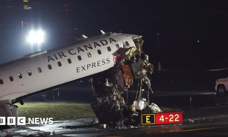 Plane and ground vehicle collide at New York's LaGuardia airport halting flights