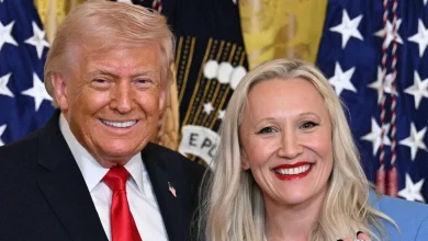 President Trump honors Olympic bobsled icon. She gives him a medal