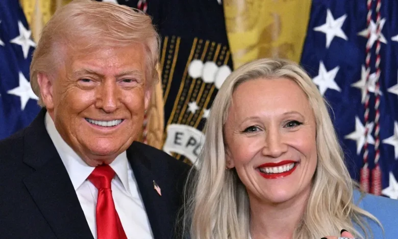 President Trump honors Olympic bobsled icon. She gives him a medal