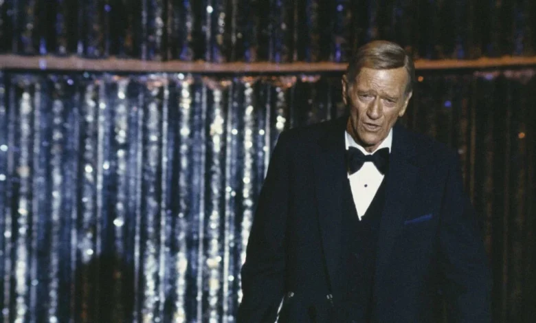 Real reason John Wayne had to be restrained at 1973 Oscars over Brando protest