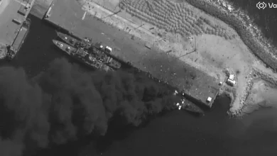 Satellite images show an Iranian warship burning pierside after US and Israeli strikes