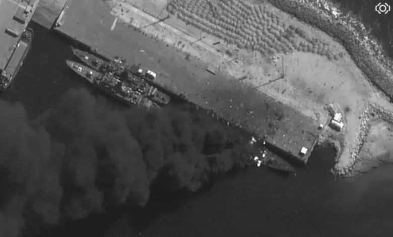 Satellite images show an Iranian warship burning pierside after US and Israeli strikes